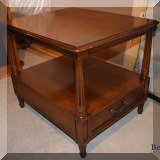 F37. Henredon tiered side table. 22”h x 22”w x 25.5”d 